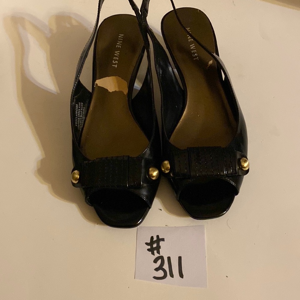 Nine West black leather sling back. Size 7. Heel height 2 inches.
